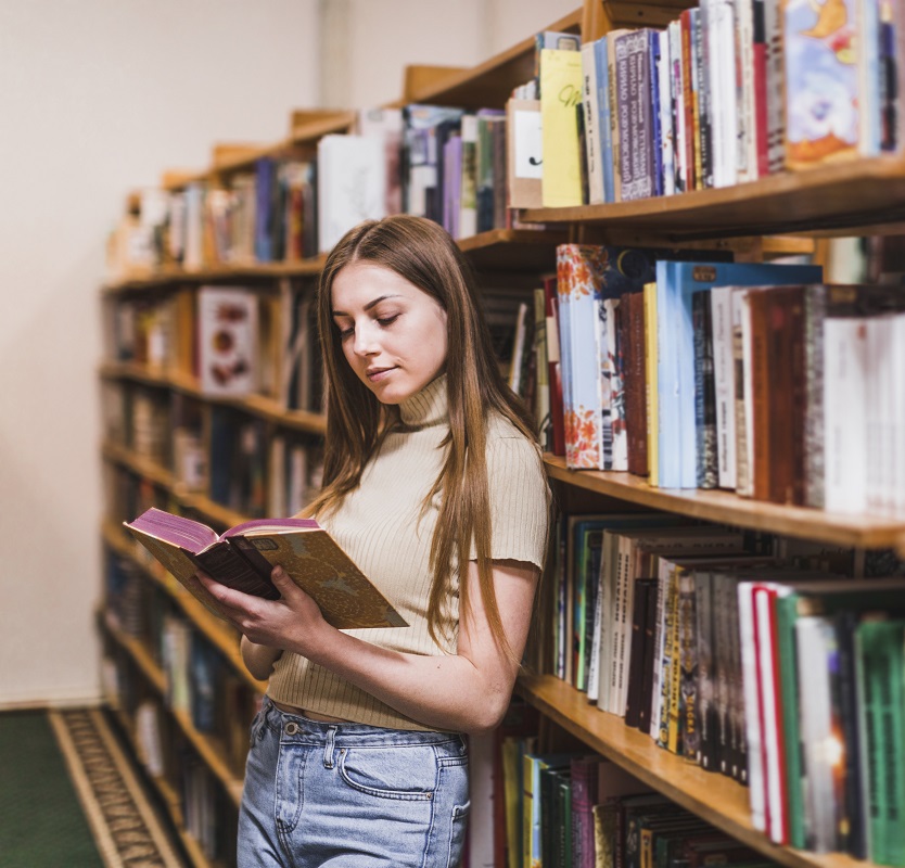 back-school-concept-with-woman-studying-library